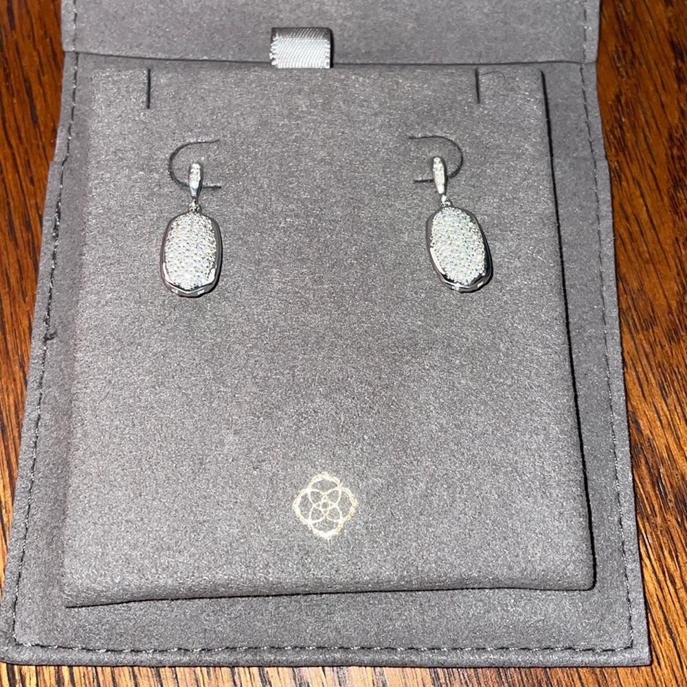 •Kendra Scott white gold diamond earrings
